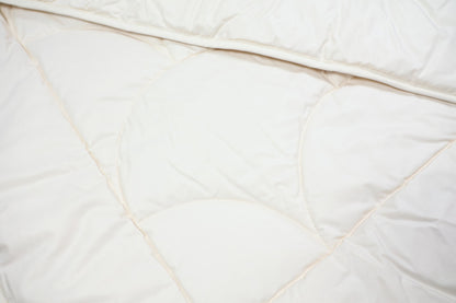 Steppbett aus 100% kbA Baumwolle – Bezug und Füllung in Bio-Qualität | KLEINER Naturbettwaren