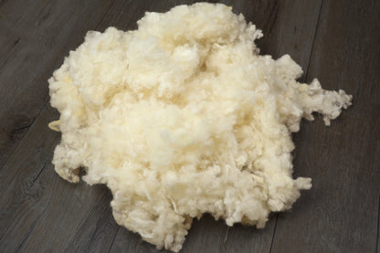Kopfkissen-Füllung Wollflocken kbT aus eigener Herstellung, 1 kg – KLEINER Naturbettwaren